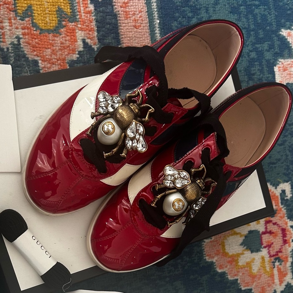 Gucci Red and Black Sneakers with Ornate Embellishments